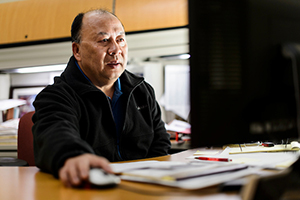 Man on desktop computer