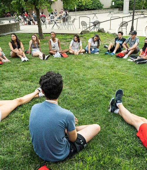 Student sitting in the grass